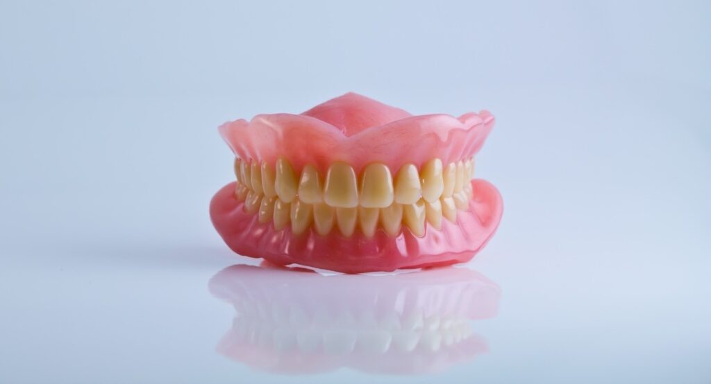 Dentures vs dental implants in Albania
