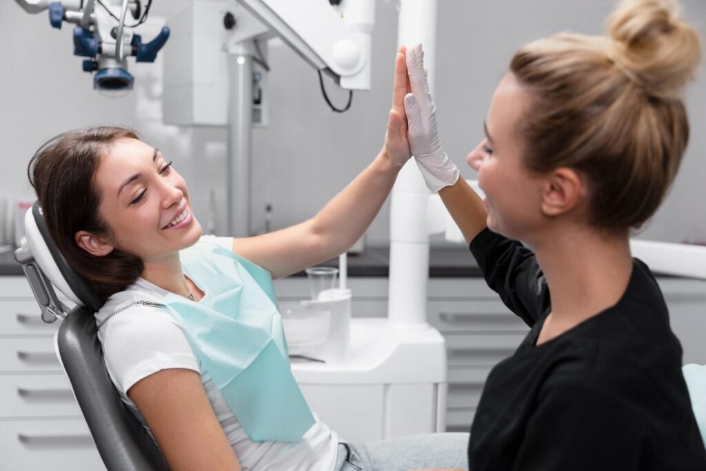 Doctor-patient consultation at a dental clinic in Tirana.