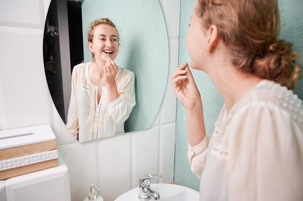 Flossing with braces
