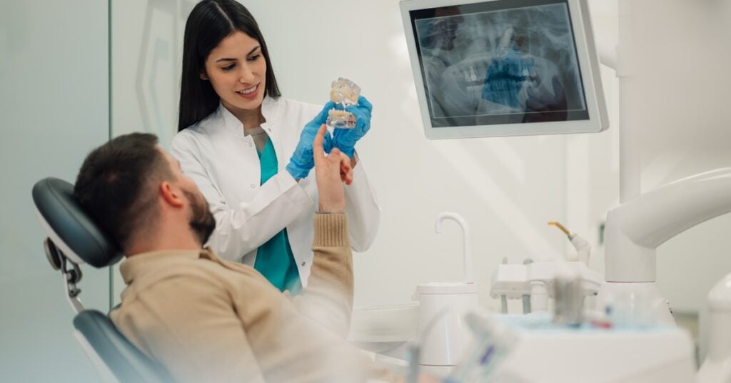 WoodstockSmiles 371144 man woman dentist blogbanner1 1024x536 1